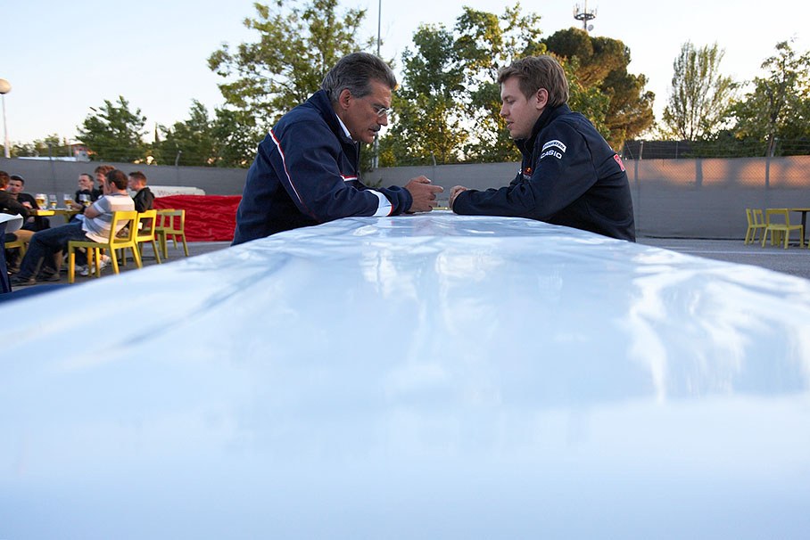 Sebastian Vettel, who once started his carreer in Formula BMW, and Dr. Mario Theissen, Dirctor of BMW Motorsport, chat in the paddock