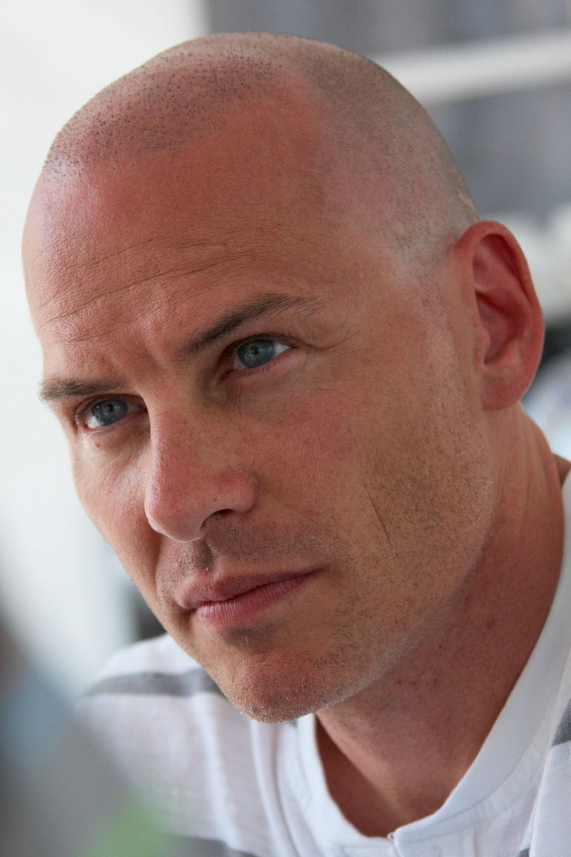 A bald-headed Formula One World Champion of 1997 Jacques Villeneuve pays a visit to the circuit named after his legendary father Gilles