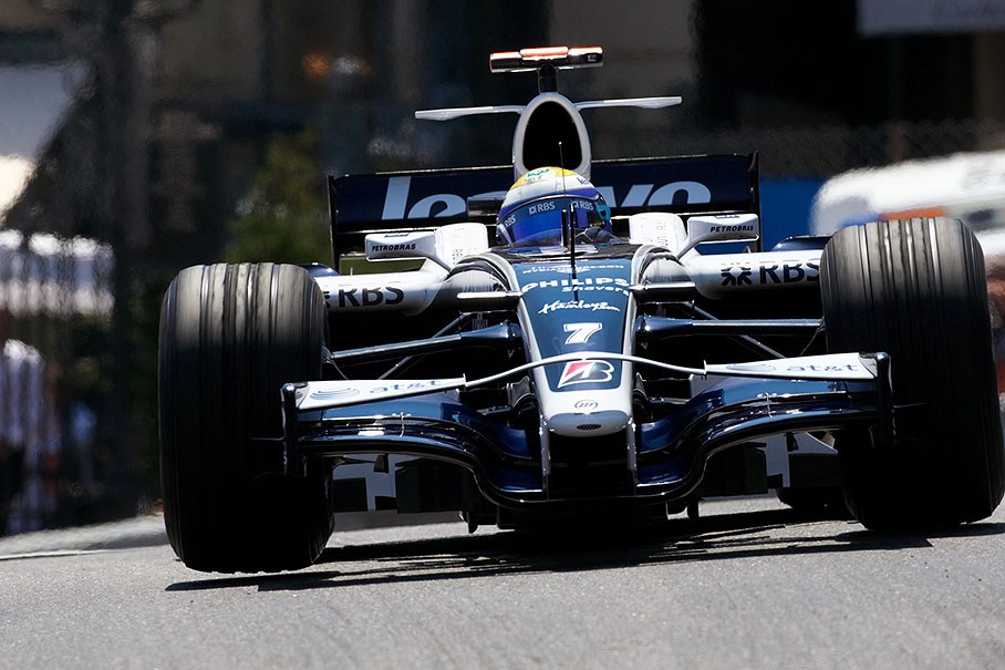 Nico Rosberg lifts both front wheels of his Williams car at Casino barrow