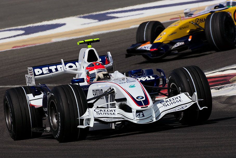 BMW Sauber driver Robert Kubica leads a Renault