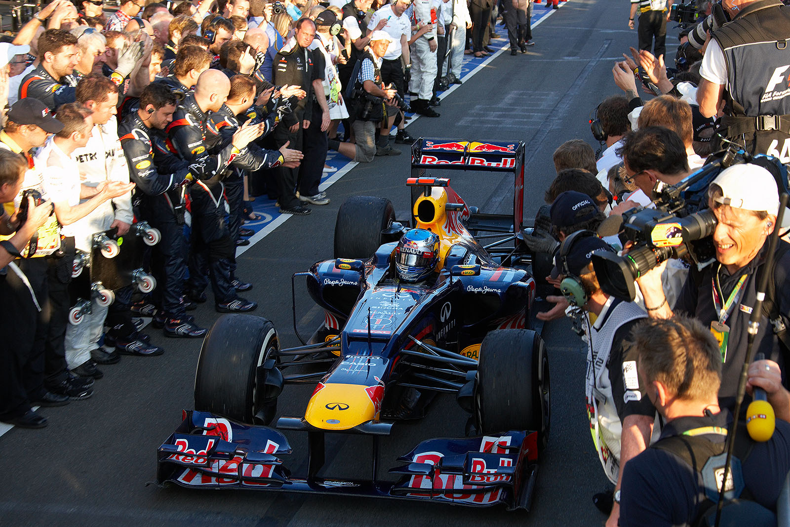 Second placed Sebastian Vettel of Red Bull Racing comes to parc ferme after the first race in Melbourne 2012