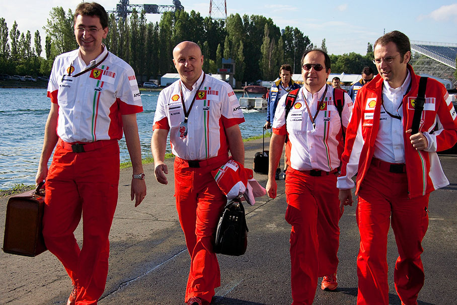 Well rested looking Ferrari executives arrive at track on Saturday morning