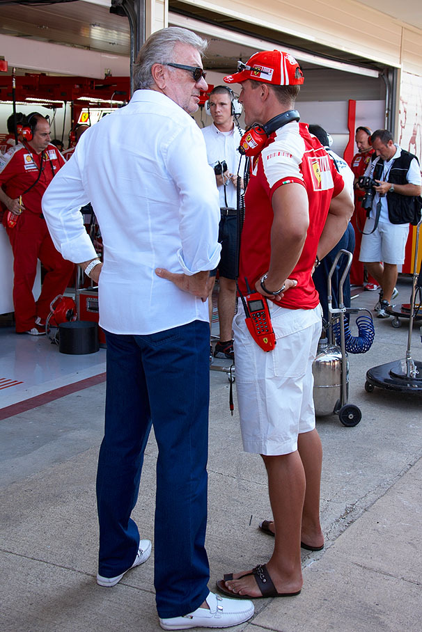 Michael Schumacher with his manager Willi Weber in Ferrari Pits