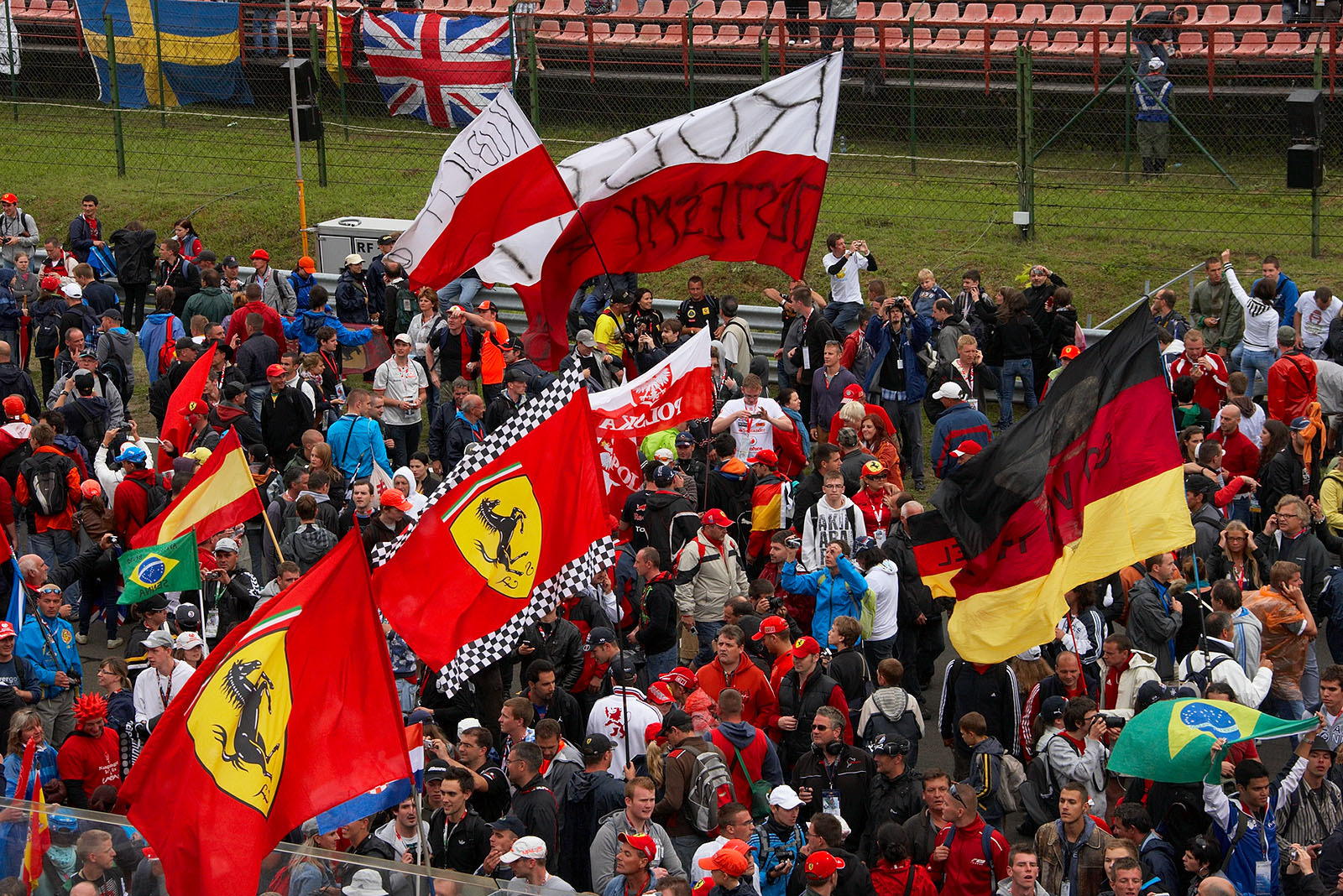 Race fans love the track invasion during the podium ceremony
