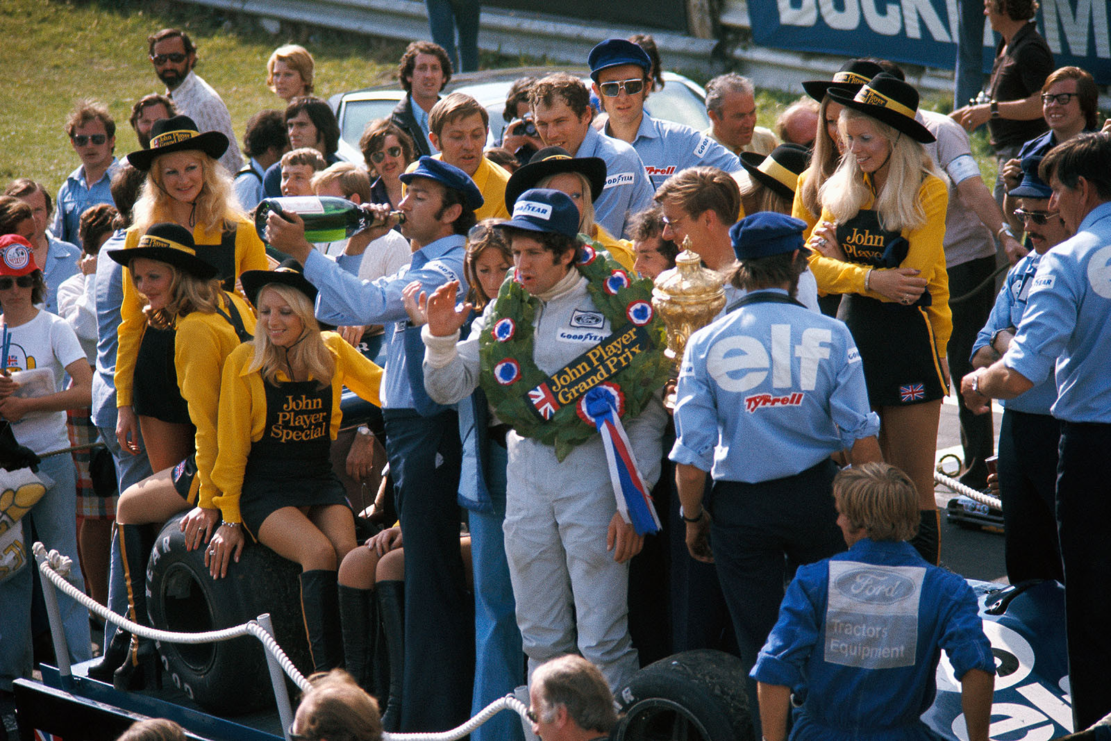 Honoury lap for race winner Jody Scheckter and the Tyrrell team, Jo Ramirez takes a sip of champagn, British Grand Prix, Brands Hatch, 1974