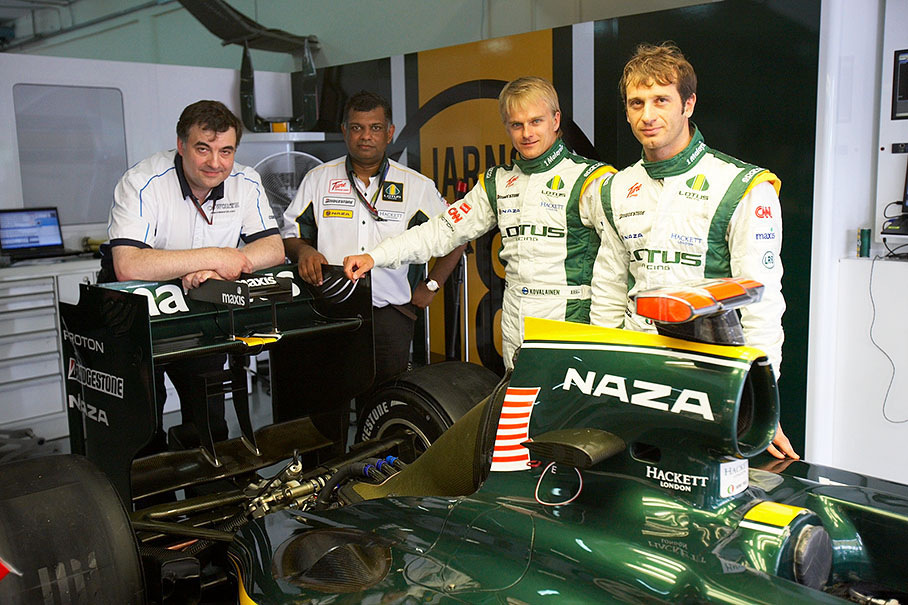 Tim Routsis, Cosworth's Managing Director and Dato' Sri Anthony Francis 'Tony' Fernandes (Lotus Team Principal and head of Air Asia) with his drivers Heikki Kovalainen and Jarno Trulli