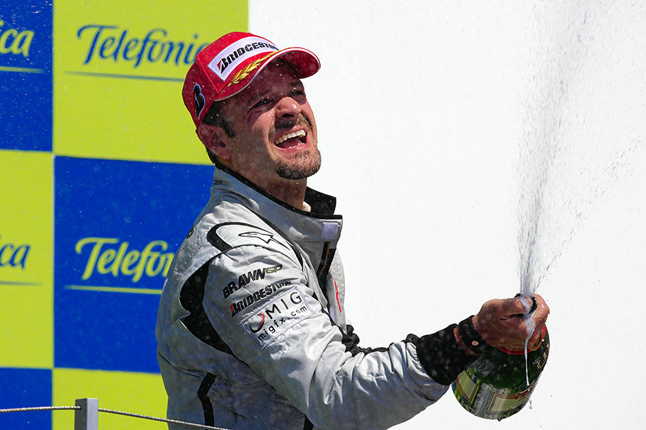 Winning driver Rubens Barrichello sprays champagne