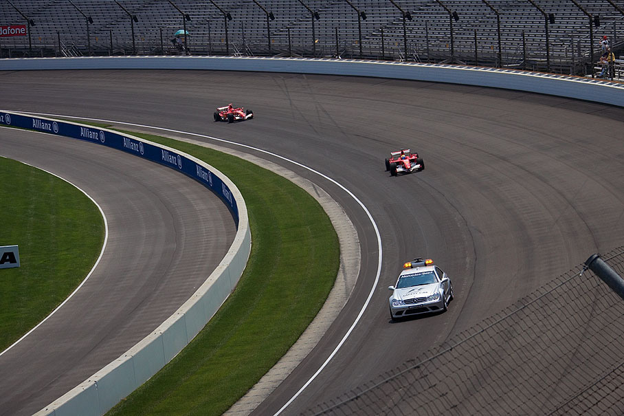 Safety car slowing down the two leading Ferraris