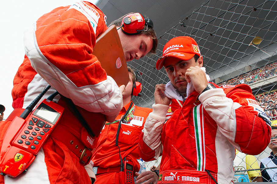 Ferrai's Felipe Massa on grid with race engineer Rob Smedley
