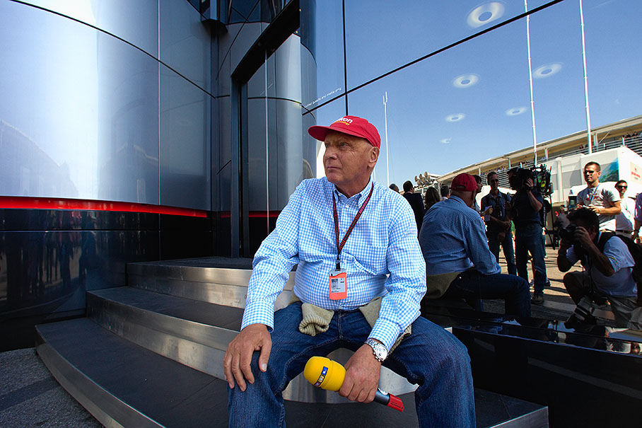 Niki Lauda tests various seating angles for optimal interview position