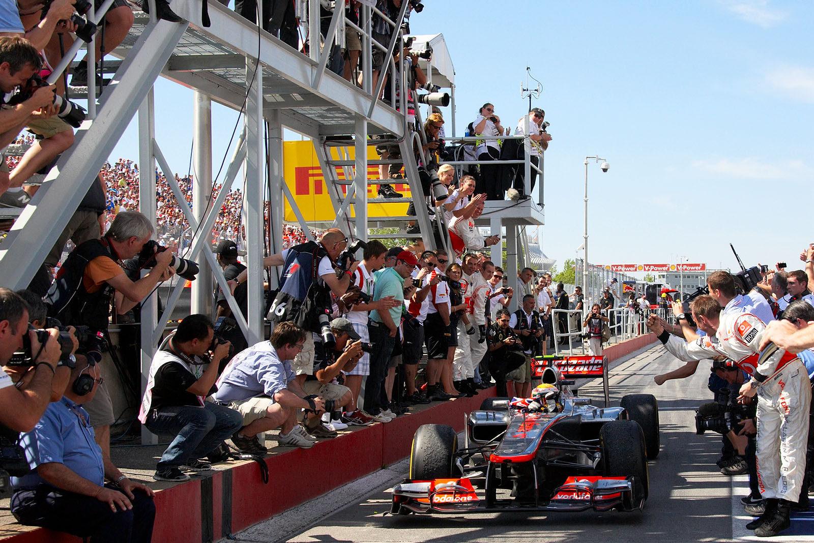 Race winner Lewis Hamilton of McLaren Mercedes approaches parc ferme after his honoury lap