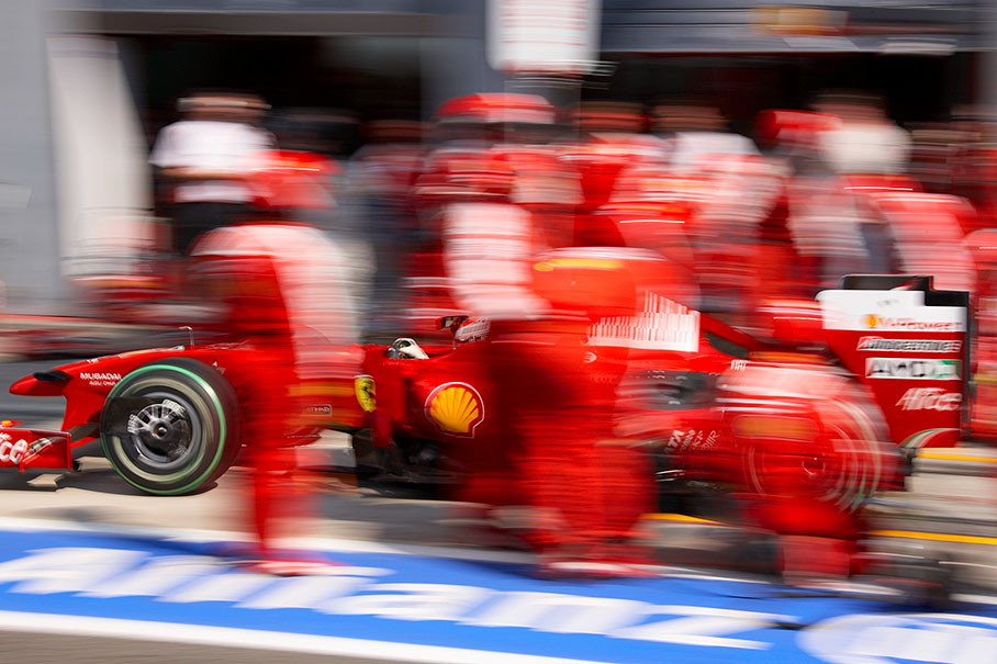 Kimi Raikkonen rushes away from Ferrari pits during qualifying part 3