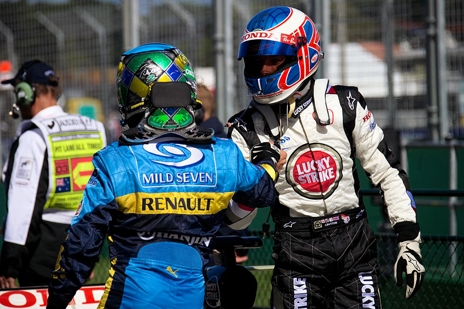 Polesetter Button and second grid placed Fisichella congratulating each other in parc ferme