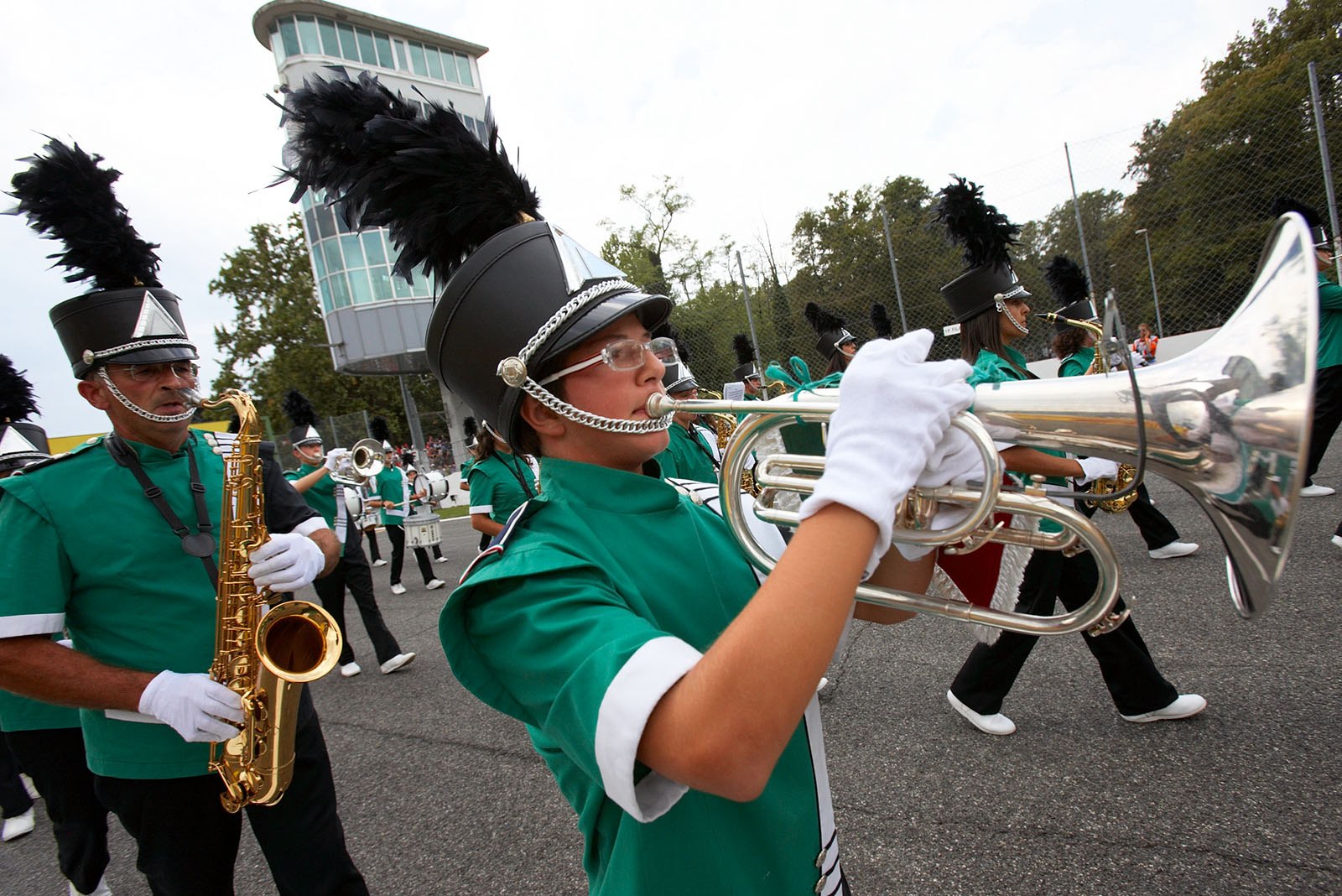 An Italian march Band occupies the grid befor the race cars turn up