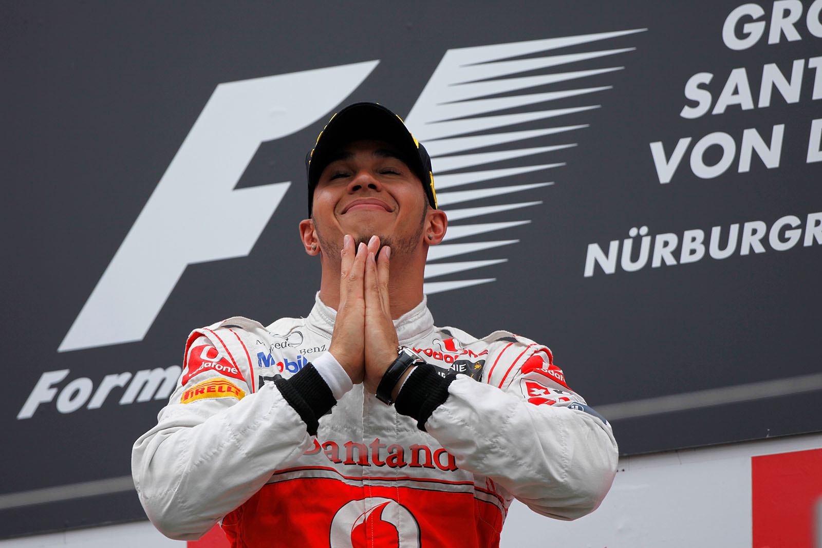 Race winner Lewis Hamilton of McLaren on podium after the German GP