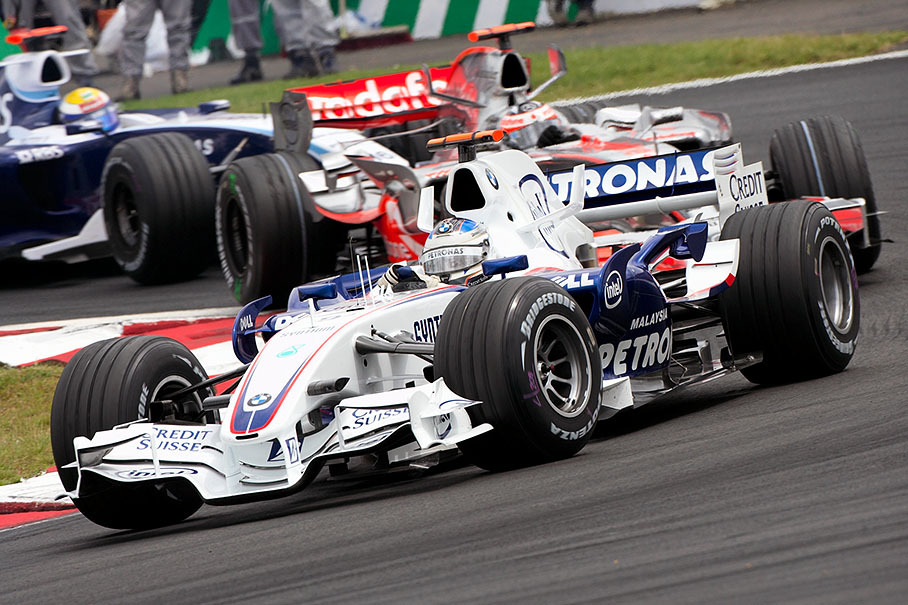 BMW Sauber driver Nick Heidfeld fights back Alonso and Rosberg