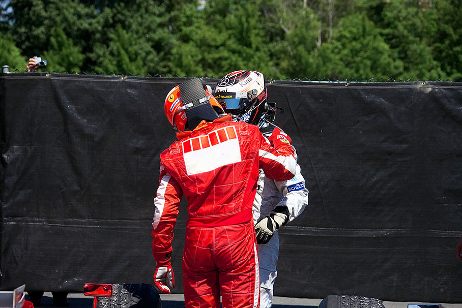 Michael Schumacher and Kimi Raikkonen in parc fermé