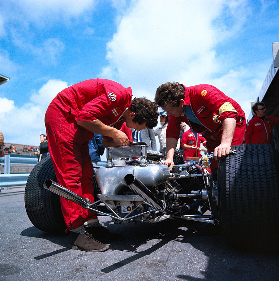 Lotus mechanics working on Oliver's car
