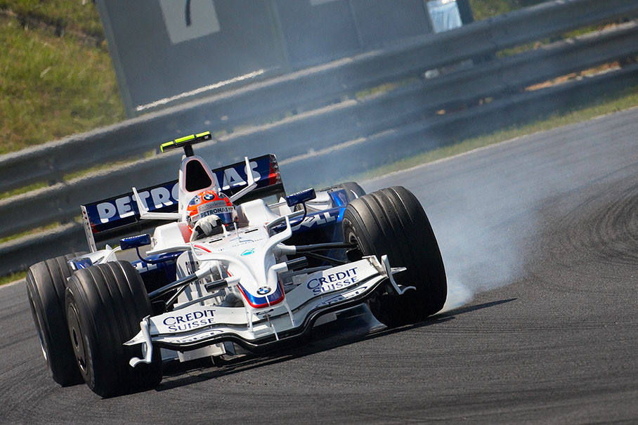 Robert Kubica drifts with smoking tires