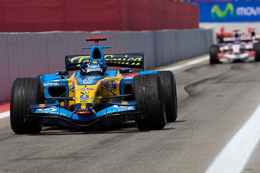 Alonso still waving on his way through pit lane entrance to parc fermé