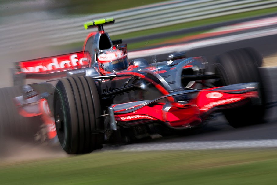 Kovalainen blows up dust behind the fast chicane