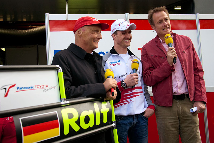 Niki Lauda, Ralf Schumacher and Florian Koenig performing an after race report for German TV broadcaster RTL