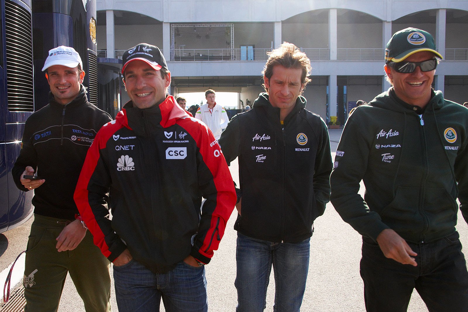 Vitantonio Liuzzi, Timo Glock, Jarno Trulli and Heikki Kovalainen return from the drivers' briefing