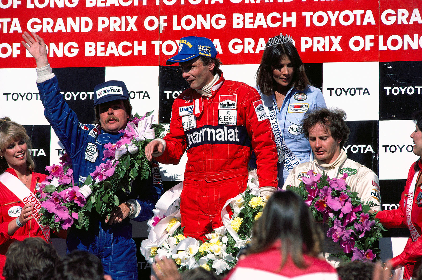 Long Beach, USA-West Grand Prix, 1982: Keke Rosberg, Niki Lauda (middle) and Gilles Villeneuve are the top three drivers on the podium. The Austrian McLaren driver Lauda won his 1st GP just three races after his comback in F1 that season.