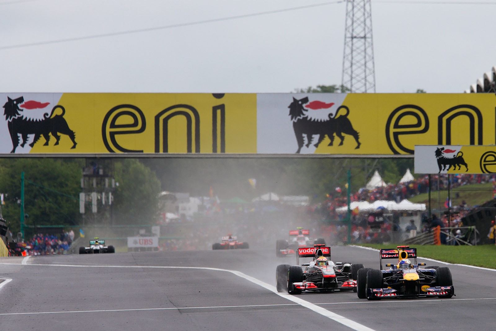 Sebastian Vettel, Red Bull Racing, and Lewis Hamilton, McLaren Mercedes, battle for the leading position