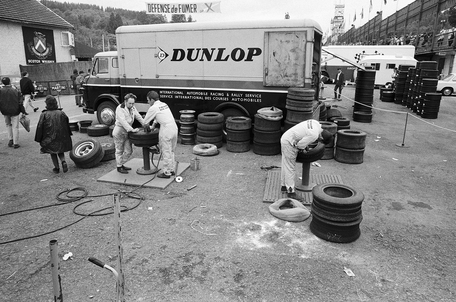 Dunlop mechanics prepare tyres in the paddock