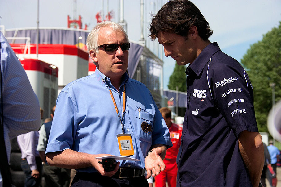 Mark Webber with Charlie Whiting (FIA)