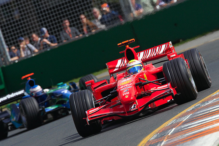 Ferrari's Felipe Massa in front of Button