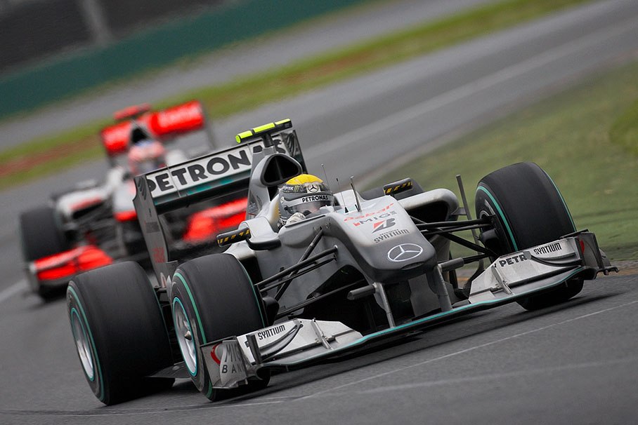 Nico Rosberg, Mercedes GP, in front of Button's McLaren