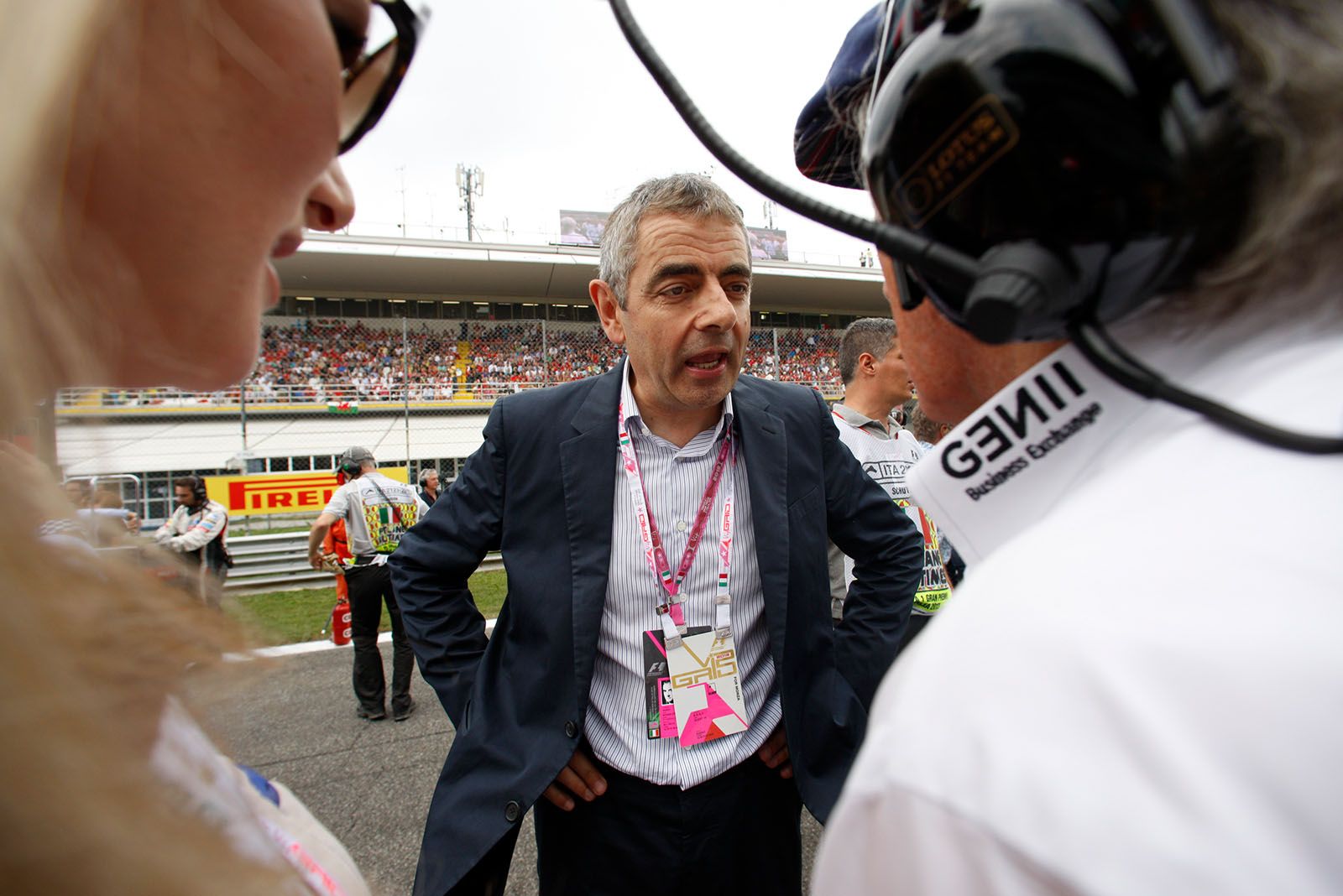 'Mr. Bean' Rowan Atkinson chats on the grid before the race