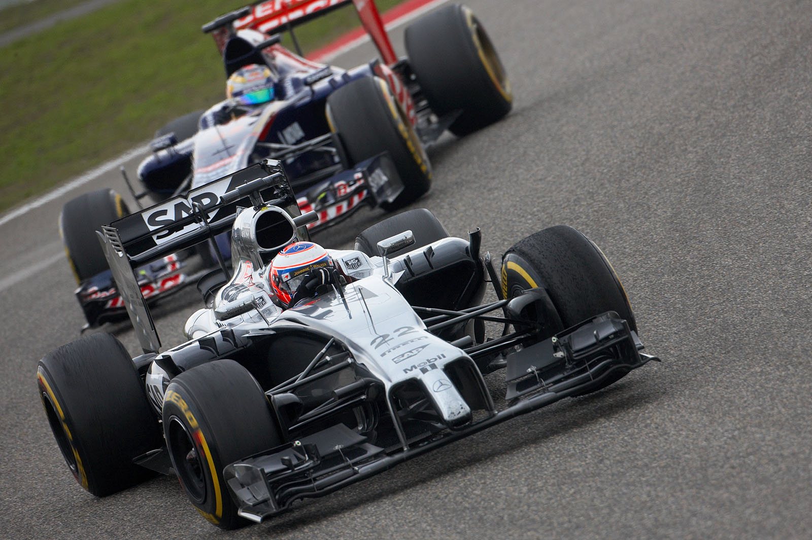 Jenson Button, McLaren-Mercedes, in front of Vergne, Shanghai, Chinese Grand Prix, 2014