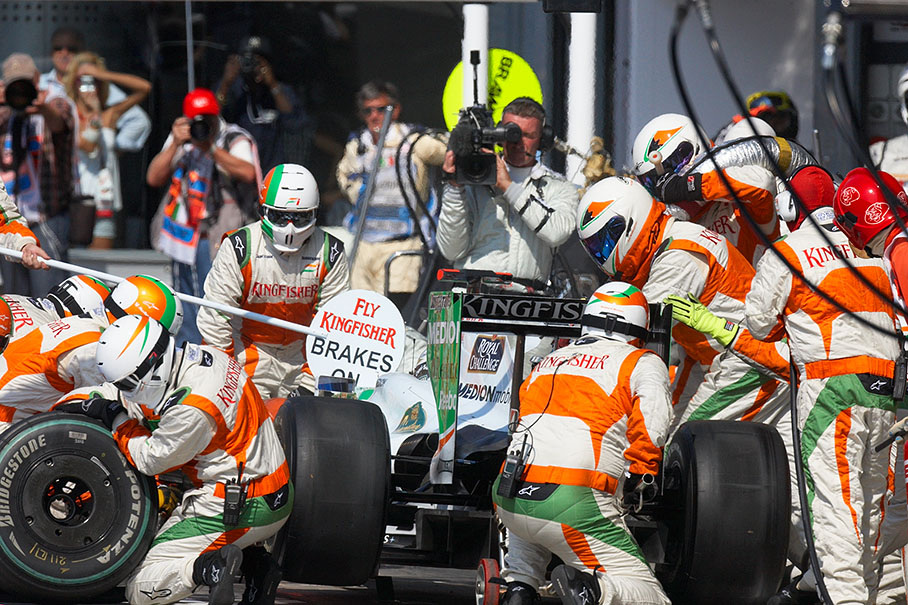 Adrian Sutil is being serviced at Force India pits