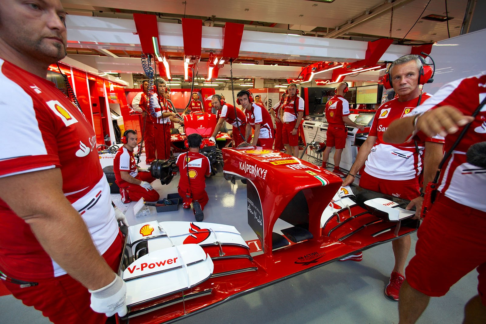 Mechanics at work on Alonso’s Ferrari