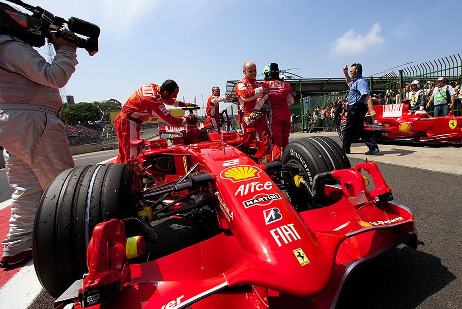 Massa's Ferrari is being prepared for scrutineering after Q3