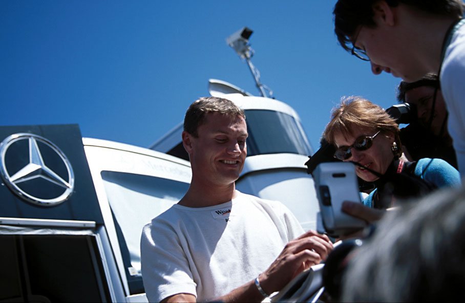 Coulthard giving autographs