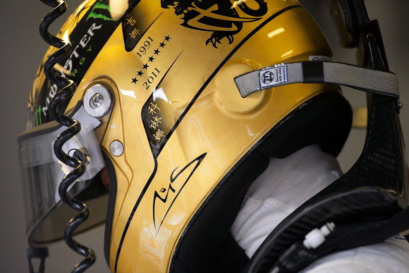 Michael Schumacher celebrates his 20th year in Formula One with a new helmet design