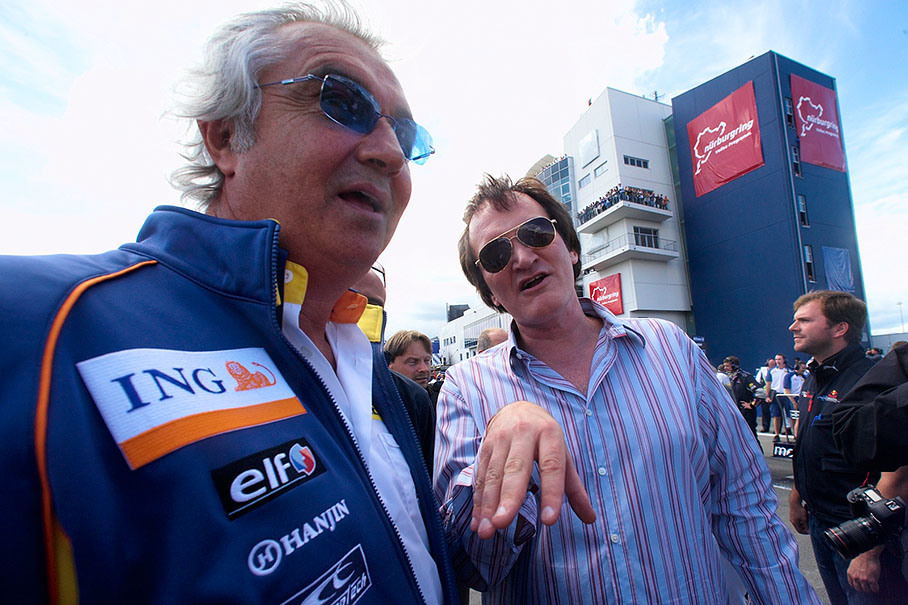 Flavio Briatore with cult director (his younger brother?;) Quentin Tarantino on the grid - need a hand?