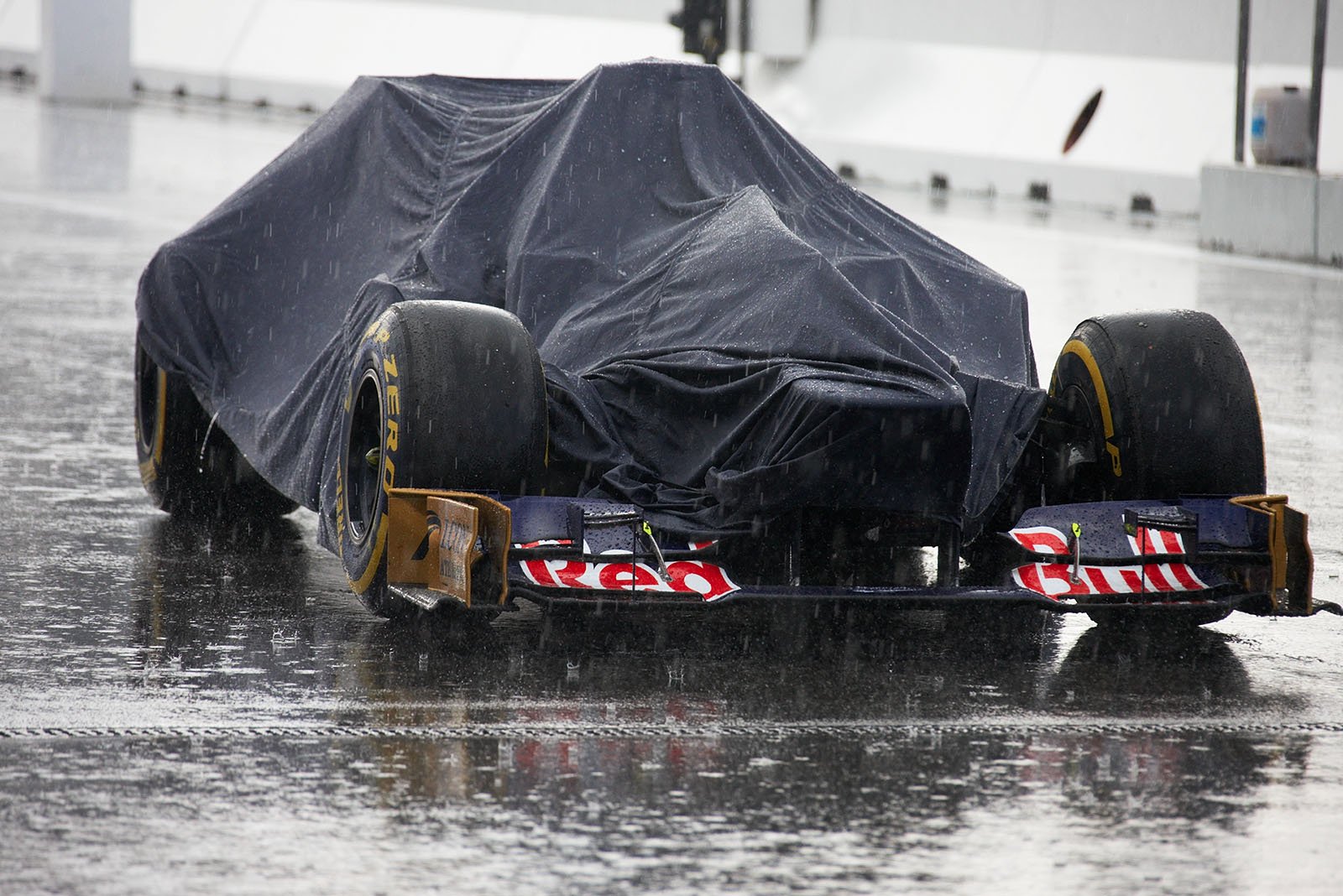 A Toro Rosso race car under cover