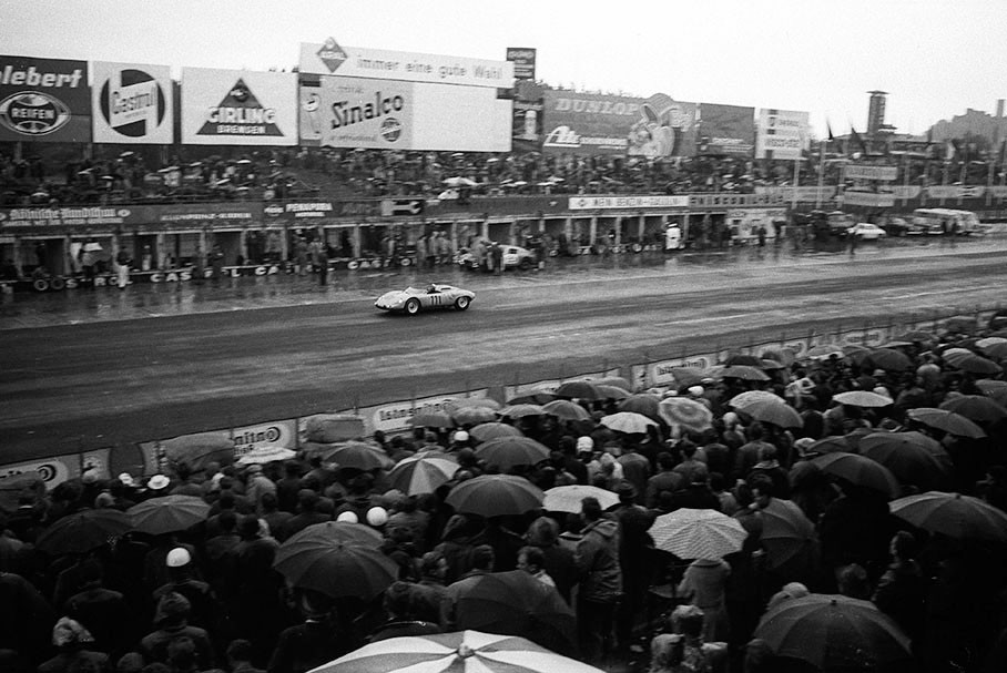 Graham Hill (GB) and Hans Herrmann (D) become third placed in the Porsche 718 WRS #047