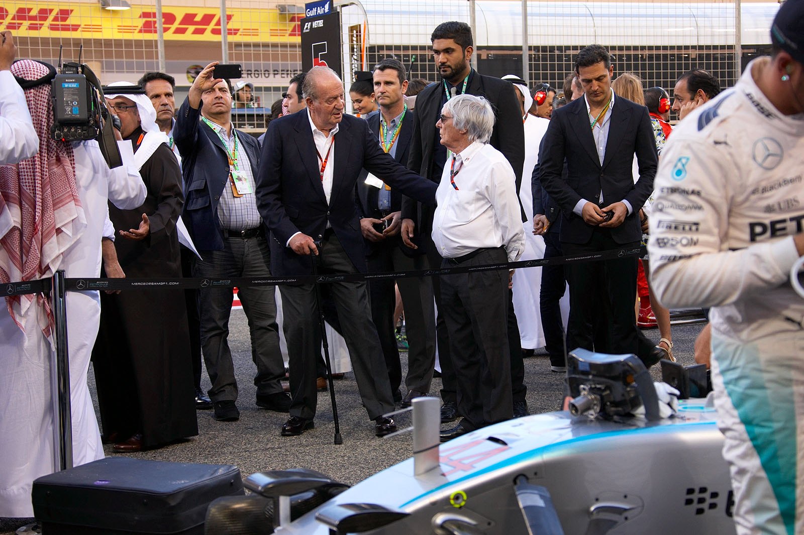Juan Carlos and Bernie Ecclestone arrived at 1st grid position, Lewis' place, Bahrain Grand Prix, 2015