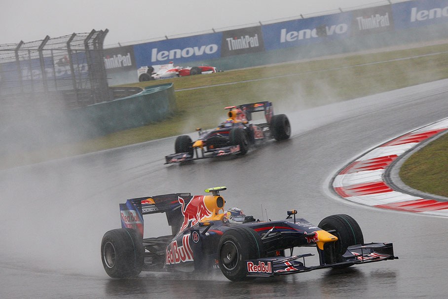 After the race is released without safety car, Vettel can push without spray blurring his sight, followed by team mate Webber and Trulli