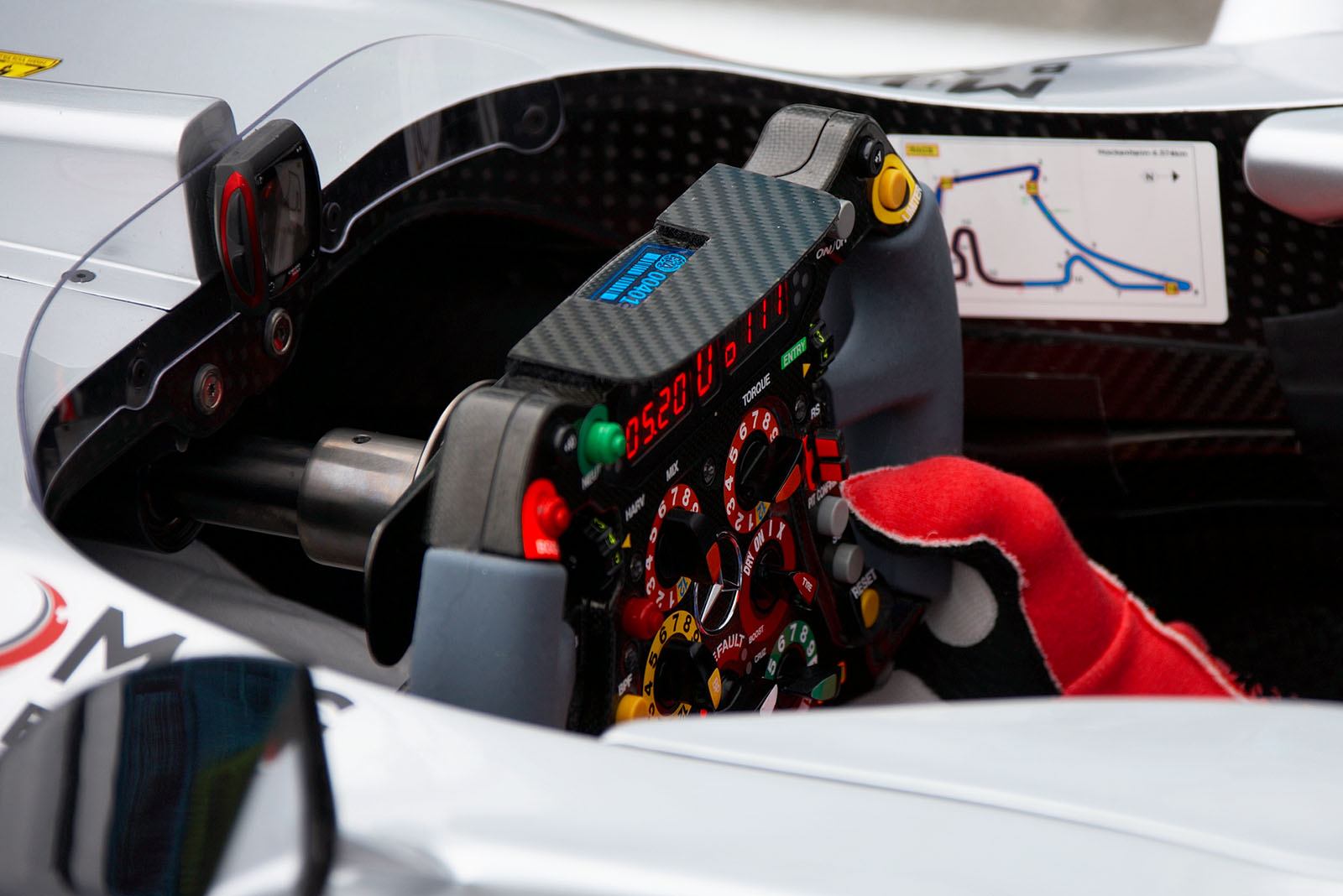 The steering wheel of a Mercedes race car