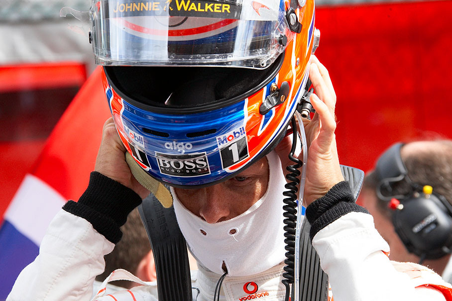 Jenson Button, McLaren Mercedes, puts his helmet on before the race