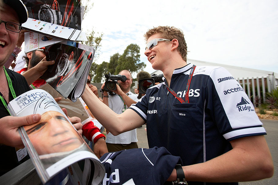 Nico Hulkenberg, the new German Williams driver, gives autographs