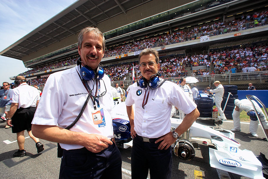 Member of the Board of BMW Dr. Klaus Draeger visits BMW Motorsport director Dr. Mario Theissen on the grid