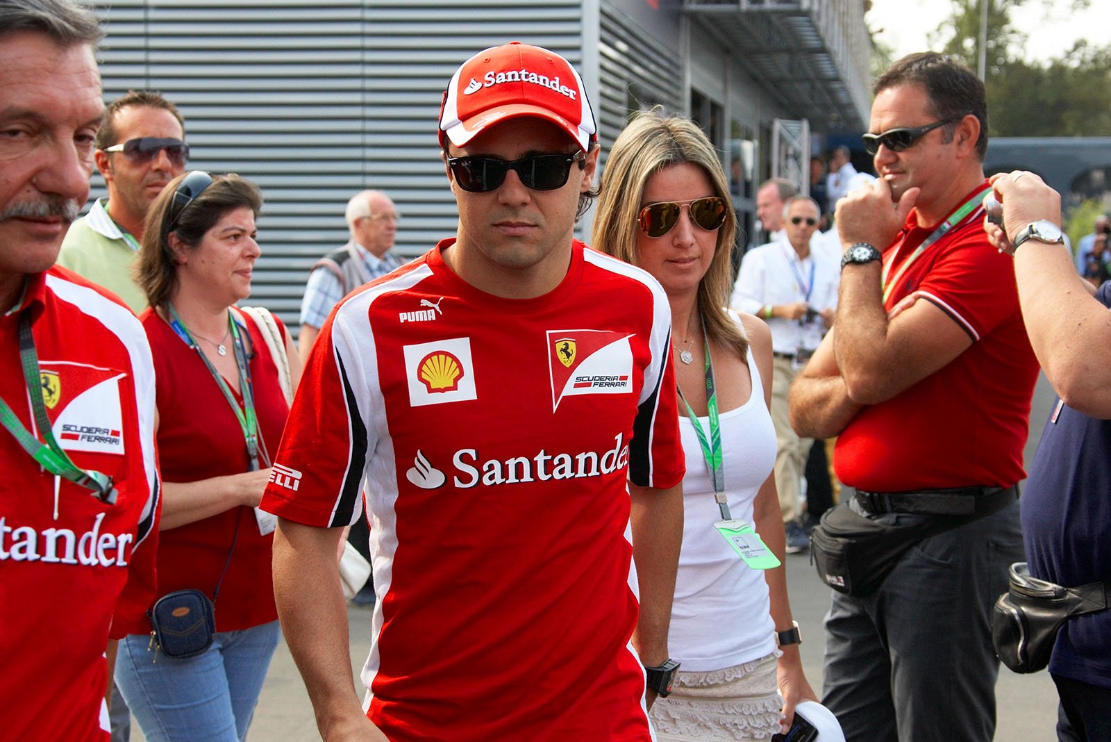 Felipe Massa and his wife arrive in the Monza paddock on Sunday morning